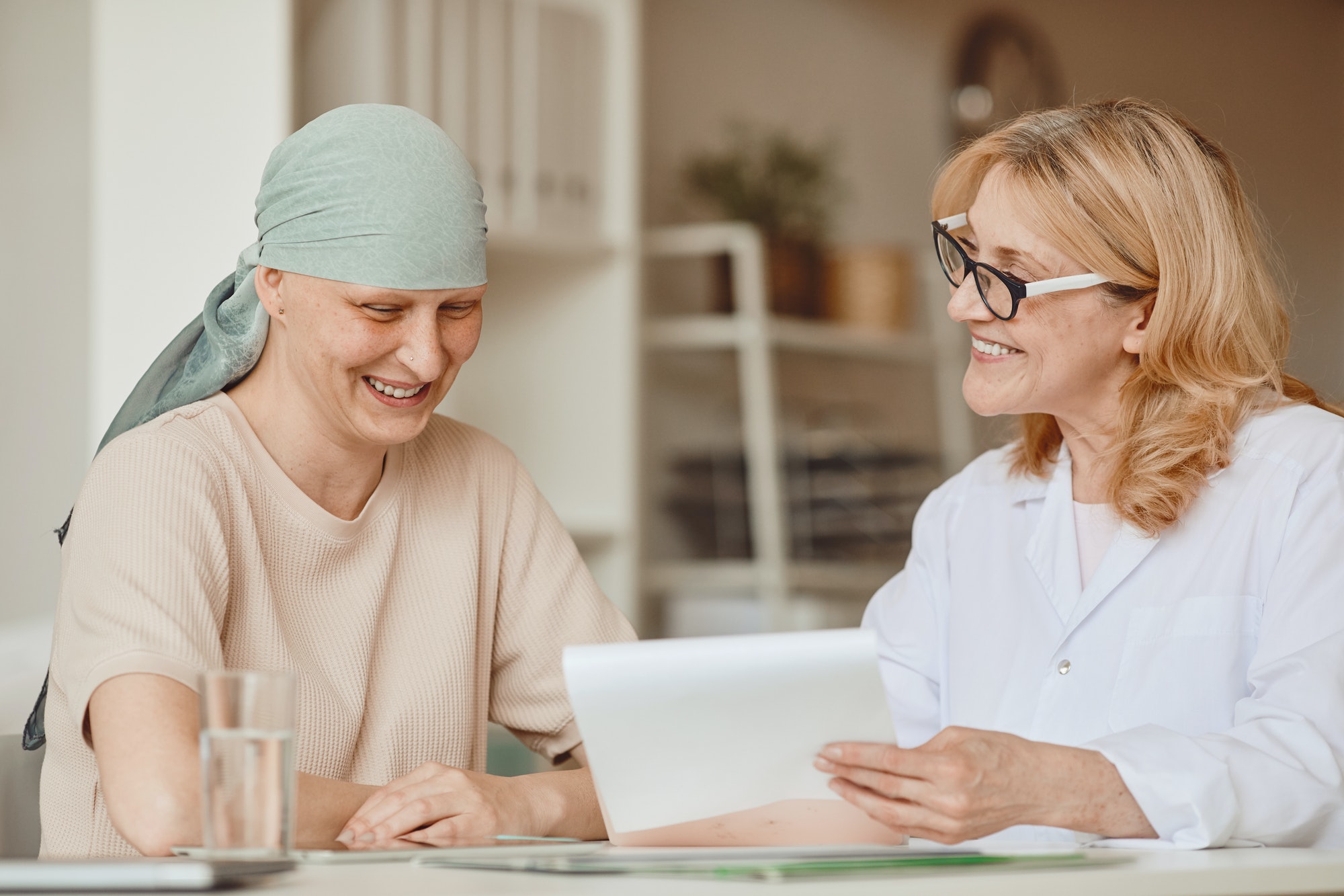 Smiling Cancer Patient Looking at test results